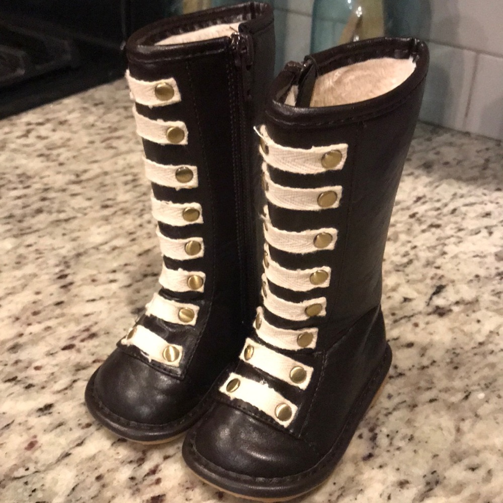 Brown squeaky boots
